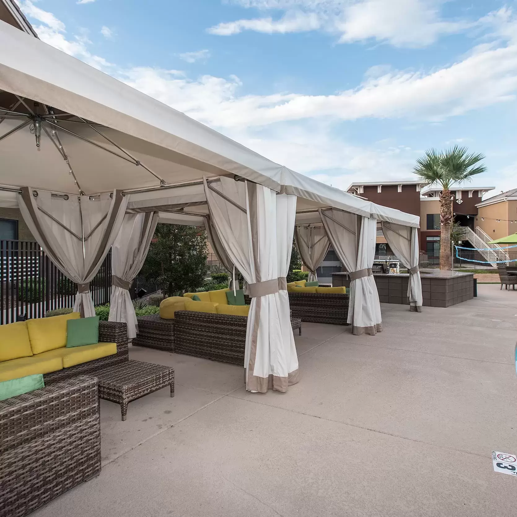 Beautiful shaded poolside cabanas offer residents a place to socialize.