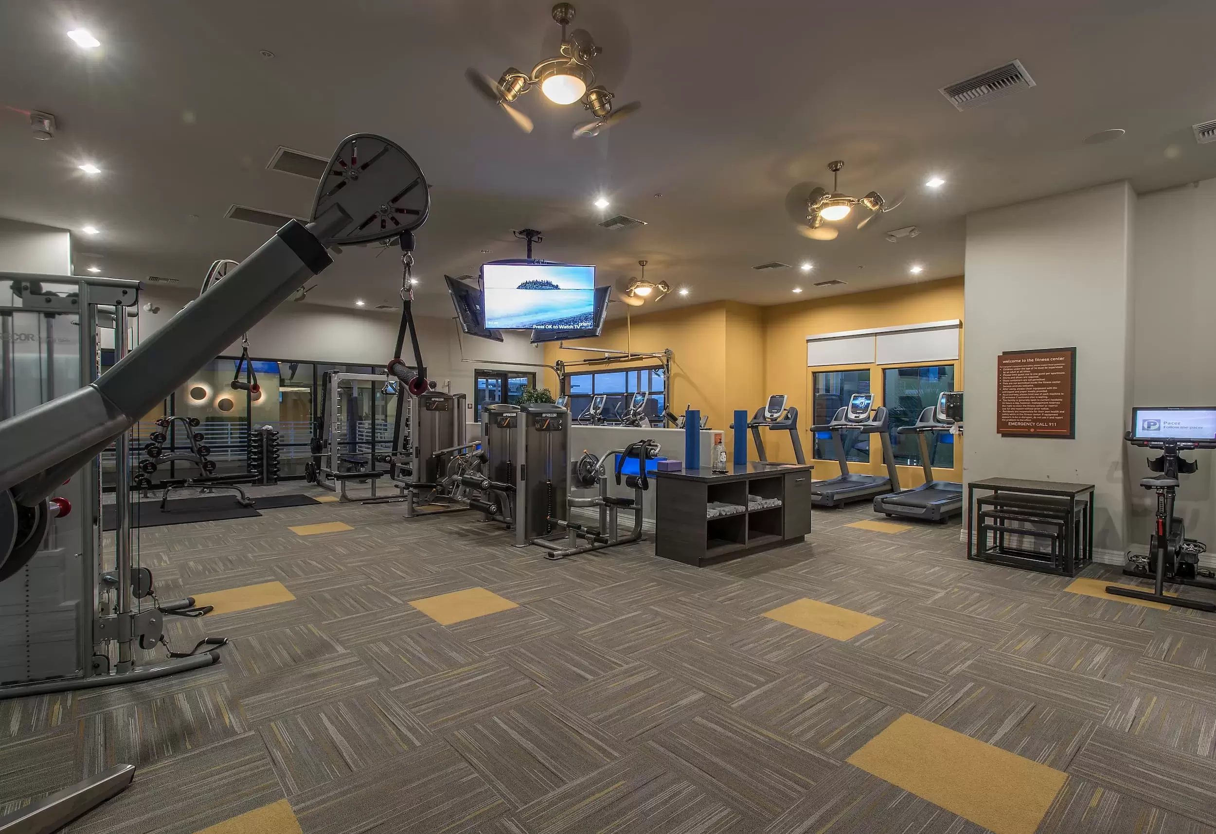 A view of the gym at Liv Northgate, with a variety of exercise machines and weights.